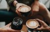 Why do health experts recommend having a few cups of coffee daily
